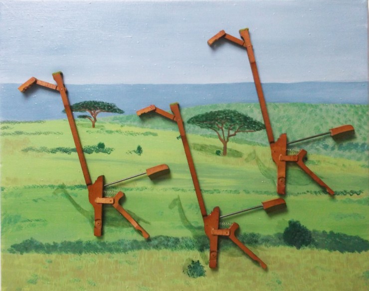 giraffes created from piano parts on painted savanna background